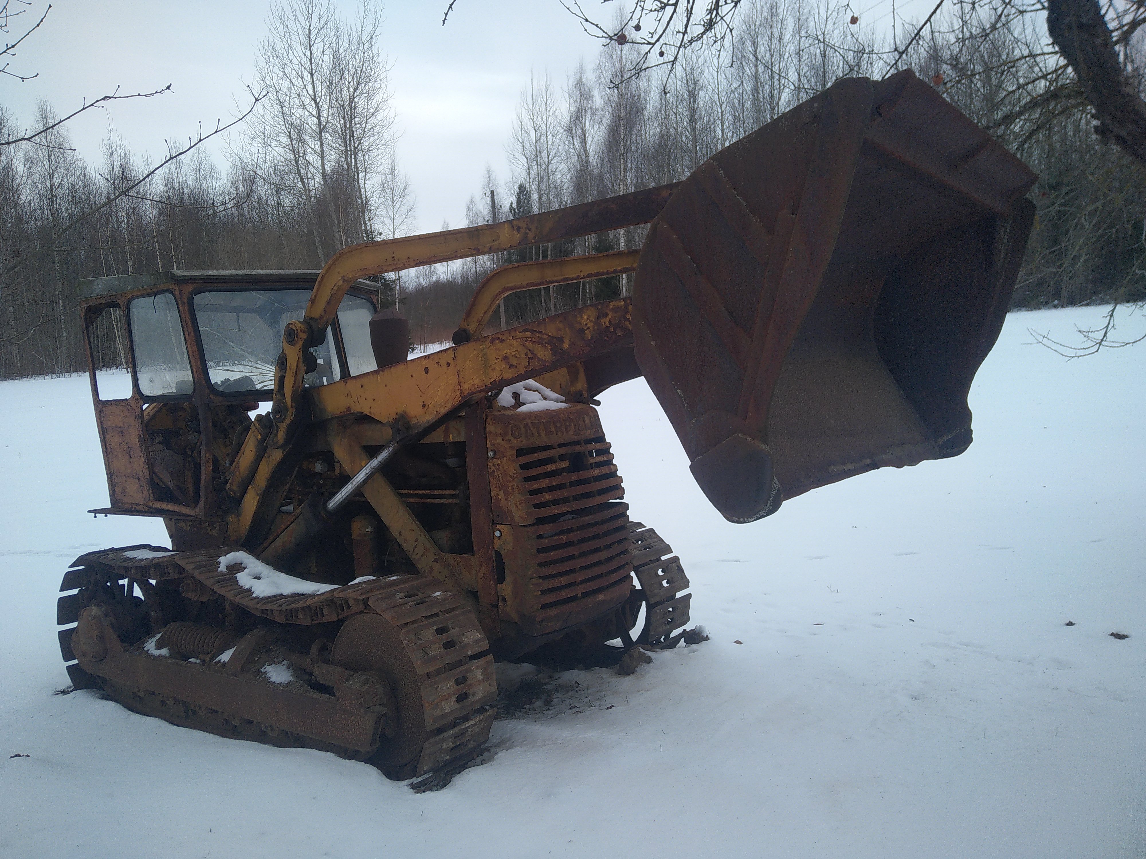 Buldozers ar frontālo iekrāvēju CAT HT4